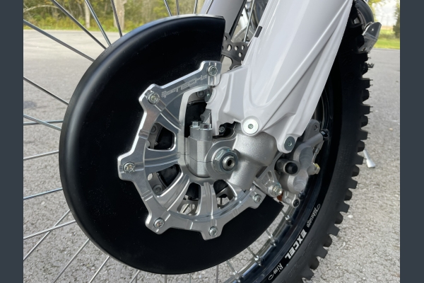 Front brake disc guard for Fantic XE 300.